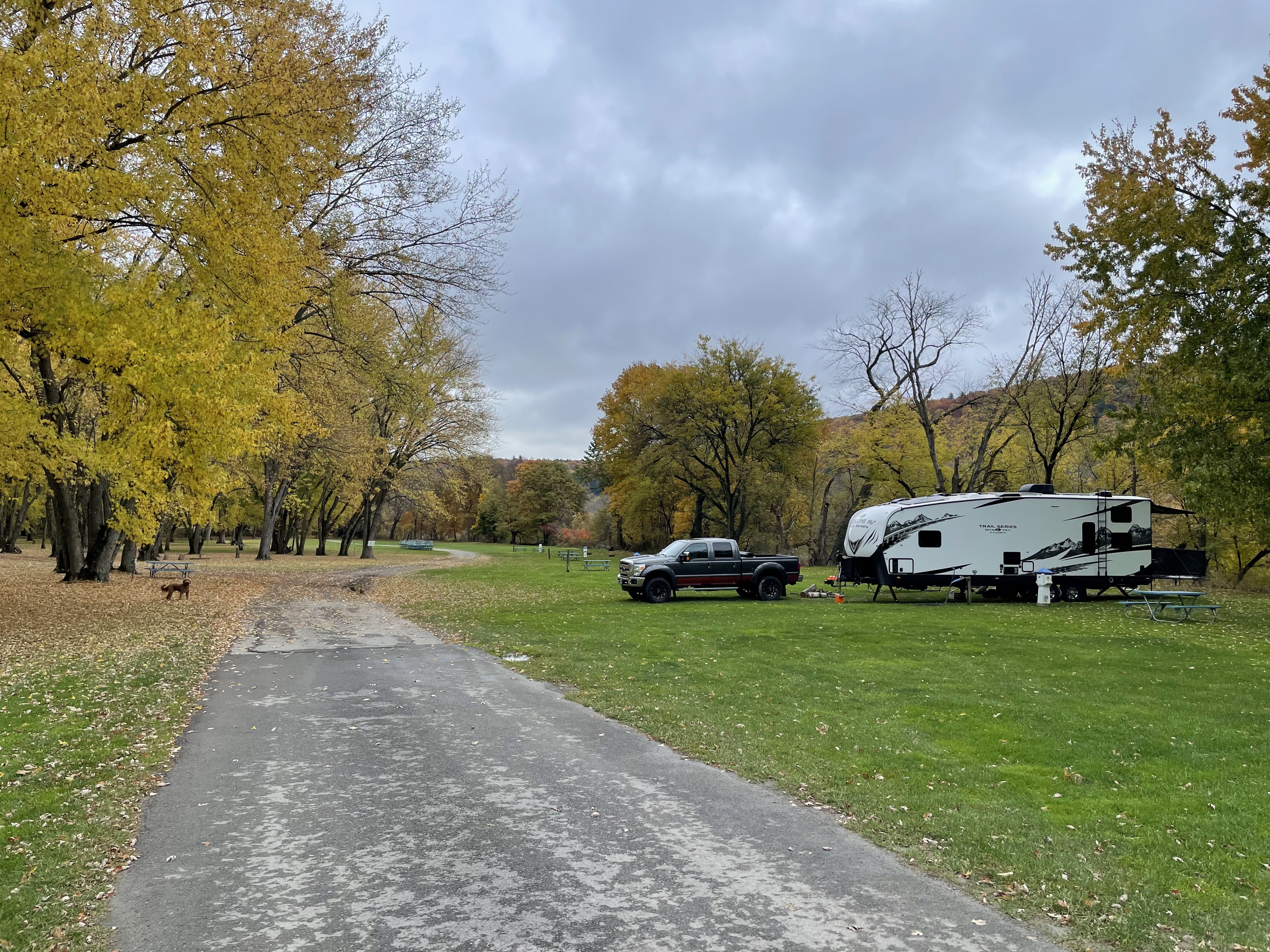 Ford F-350 towing Outdoors RV Mountain Trail 29TRX toy hauler